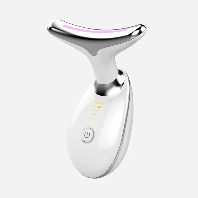 White and silver facial massager on a white background
